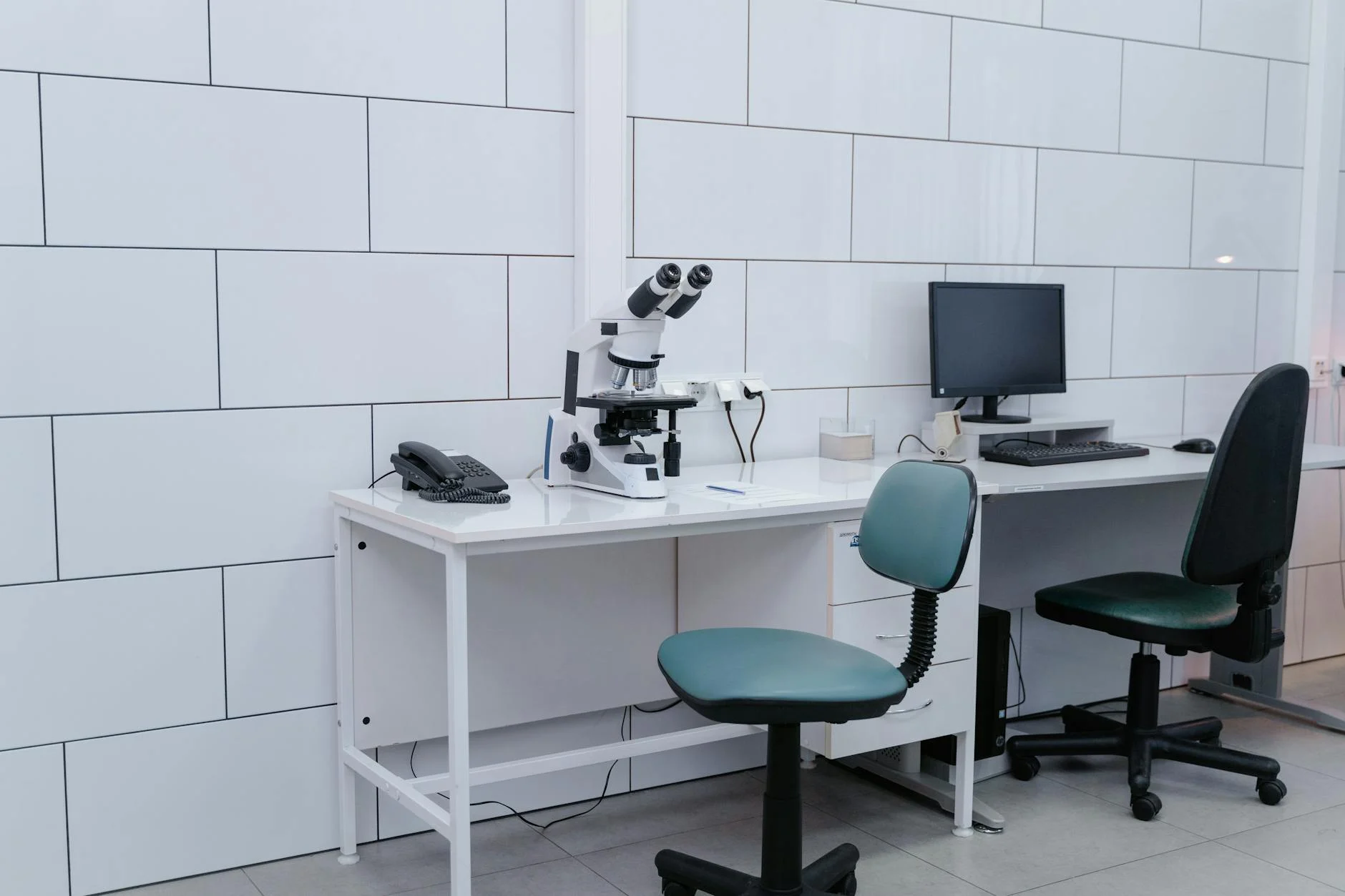 Laboratory workspace with microscope